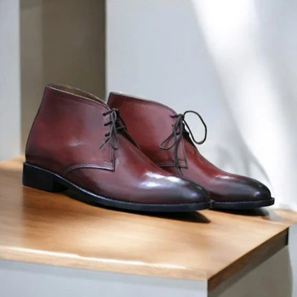 Versatile men's Chukka boots crafted from premium leather, featuring a classic ankle-high design and lace-up closure for a perfect blend of style and comfort.