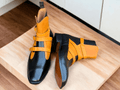 Crafted for those who value quality and individuality, our Handmade Yellow Black Four Buckle Boots are the perfect addition to your shoe collection. With meticulous craftsmanship and bespoke design, these boots exude elegance and style. Stand out from the crowd with these unique and striking boots.