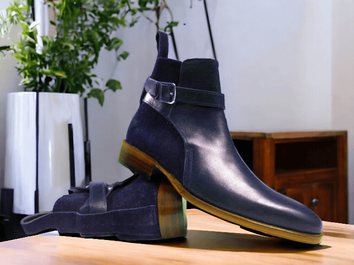 "These Men's Navy Blue Jodhpurs Buckle Boots are a must-have for any fashion-forward man. Handmade with precision, these boots boast a luxurious design that will elevate any outfit. With their unique buckle feature, these boots offer both style and functionality. Add a touch of sophistication to your wardrobe with these statement boots."