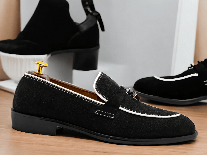 Upgrade your shoe game with our New Men's Black & White Suede Slip On Loafer Tussle Shoes. Crafted from high-quality suede, these shoes offer a comfortable and stylish fit. The perfect combination of classic black and trendy white, these shoes will elevate any outfit. Slip on and step up your style game today.