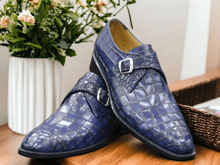 Indulge in luxury with our Handmade Blue Alligator Print Shoes for men. Made with the finest materials, these formal buckle shoes exude elegance and sophistication. Step out in style with our unique and stylish shoes, handcrafted to perfection. Elevate your look and make a statement with our alligator print shoes.