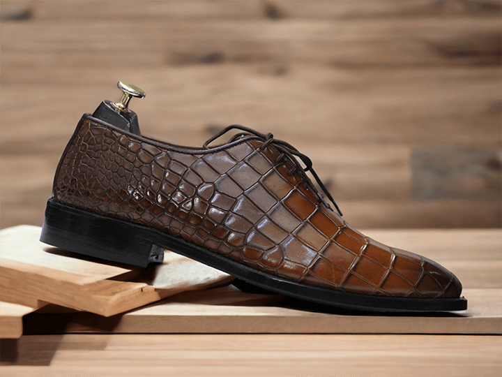 Experience refined durability in our alligator oxford shoes for men. Crafted with high-grade alligator leather, these shoes are designed to last, while providing long-lasting comfort and style. Perfect for formal occasions or daily wear, you won't regret the purchase.