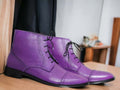 Expertly crafted with vibrant hand-painted purple leather, these ankle high boots are a unique addition to any wardrobe. The high-quality leather offers durability and style, while the ankle height provides excellent support and comfort. Add a pop of color to your outfit with these one-of-a-kind boots.