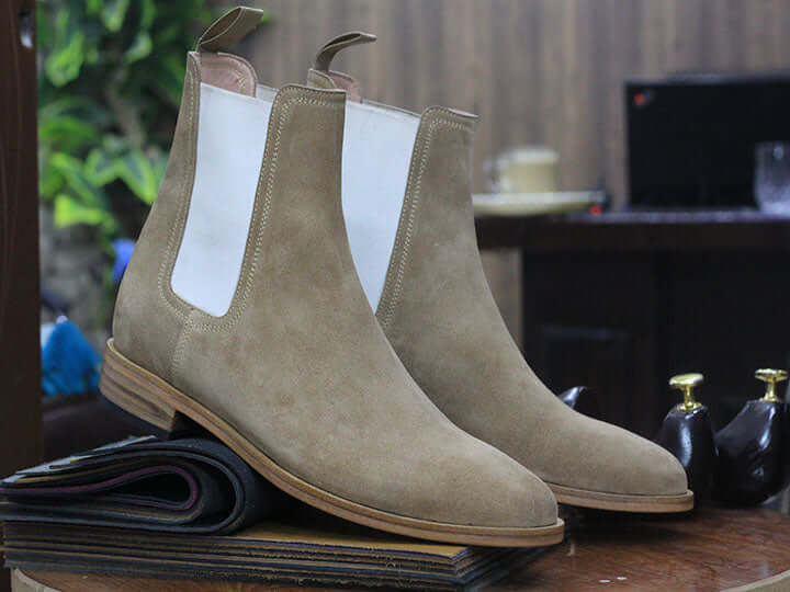 Effortlessly elevate your everyday look with our Ankle High Beige Chelsea Suede Boot. Crafted from premium suede, these boots offer both style and comfort. The ankle high design provides support and stability, while the classic beige color adds a touch of sophistication to any outfit. Perfect for any occasion, these boots are a must-have for any wardrobe.