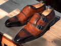 These Men's Handmade Burgundy Double Monk Buckle Strap Shoes feature a stylish burgundy hue and a handmade design for a unique and sophisticated look. The double monk buckle strap adds a touch of elegance and ensures a secure fit. Elevate your style with these high-quality, handcrafted shoes.