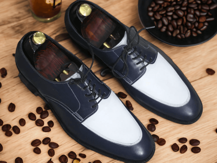  These high-quality Bespoke Handmade Brown White Derby Lace Up Shoes are perfect for any professional office setting. Crafted with an unbeatable combination of strong materials and precision stitching, they offer superior comfort and durability. Their brown and white color palette adds a touch of sophistication to any ensemble.