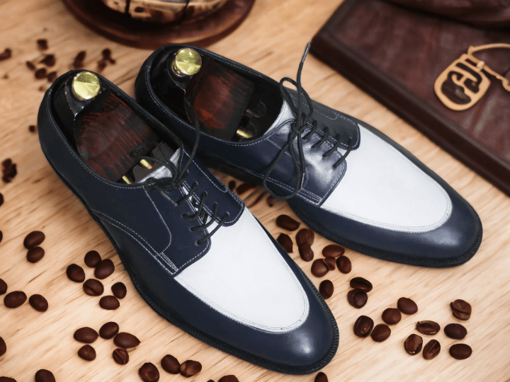  These high-quality Bespoke Handmade Brown White Derby Lace Up Shoes are perfect for any professional office setting. Crafted with an unbeatable combination of strong materials and precision stitching, they offer superior comfort and durability. Their brown and white color palette adds a touch of sophistication to any ensemble.