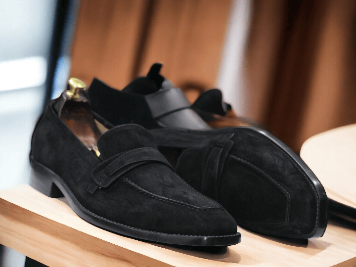 Introducing our Bespoke New Black Suede Penny Loafer Shoes - the perfect blend of style and comfort. These slip-on casual shoes are a must-have for any fashion-forward man's wardrobe. Made with high-quality materials and designed for street wear, these shoes will elevate your look.