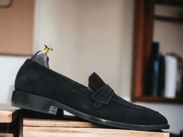 Introducing our Bespoke New Black Suede Penny Loafer Shoes - the perfect blend of style and comfort. These slip-on casual shoes are a must-have for any fashion-forward man's wardrobe. Made with high-quality materials and designed for street wear, these shoes will elevate your look.