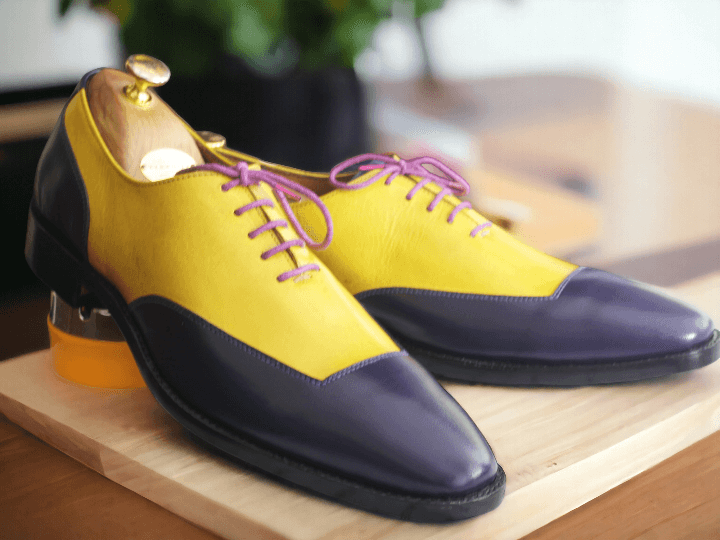 crafted with High Quality genuine leather, these bespoke blue and yellow oxfords are the perfect addition to your office dress shoes collection. Designed for men, these lace-up shoes offer both style and comfort for a polished and professional look.