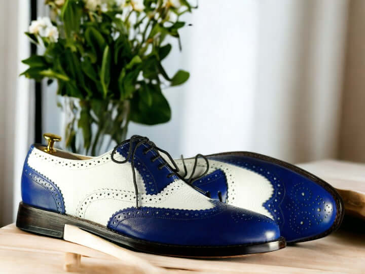 Make a fashionable statement with these Blue White Oxfords Shoes. These shoes are crafted with a classic Oxford design and feature a striking blue and white color palette. Perfect for any occasion, you'll be sure to stand out wearing these stylish shoes.