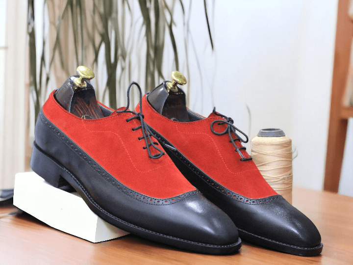 Expertly crafted by hand, these designer Black Two Tone Oxfords for men exude style and sophistication. Made with premium materials, these shoes are built to last and provide lasting comfort. Elevate your wardrobe and make a statement with these must-have shoes.