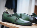 These men's green leather suede double buckle shoes make an elegant statement. Crafted with luxury leather and suede, these shoes feature double buckles for adjustable fit and comfort. Enjoy the classic style of these shoes, perfect for any occasion.