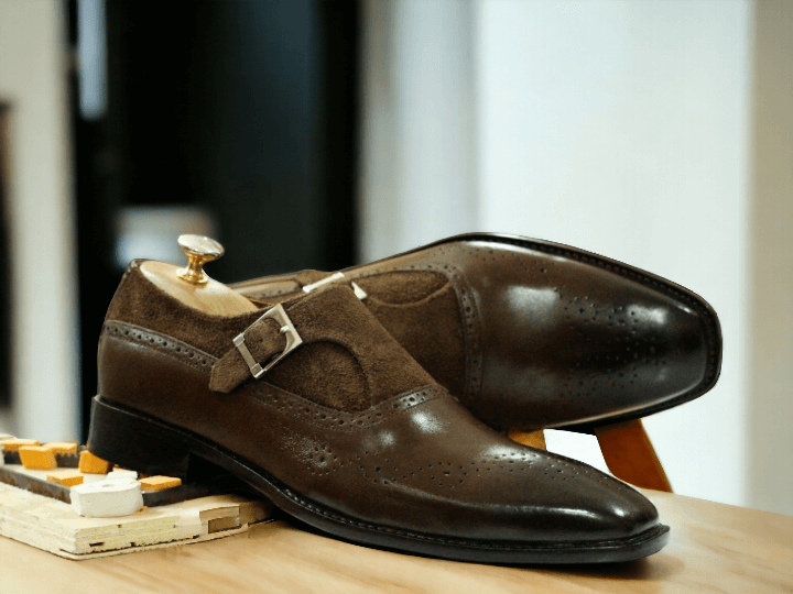 These handmade brown leather suede brogue monk strap shoes are the perfect choice for a man who values both style and quality. With their expert craftsmanship and elegant design, these dress formal shoes are sure to make a statement and elevate any outfit. Step out in confidence and sophistication with these must-have shoes.