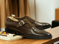 These handmade brown leather suede brogue monk strap shoes are the perfect choice for a man who values both style and quality. With their expert craftsmanship and elegant design, these dress formal shoes are sure to make a statement and elevate any outfit. Step out in confidence and sophistication with these must-have shoes.