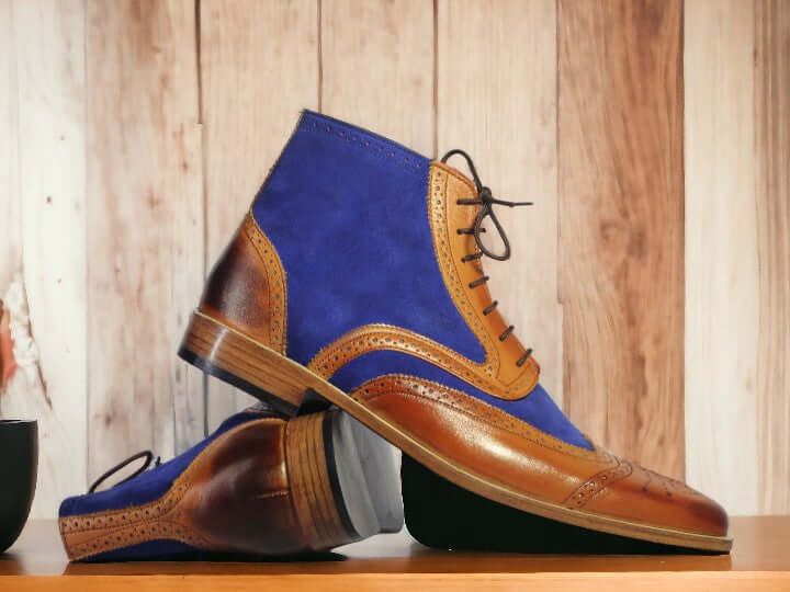 Expertly crafted for style and durability, these Men Tan Two Tone Leather Ankle Boots feature a unique hand painted design. Made from high quality leather, these boots offer both comfort and a touch of sophistication to any outfit. Elevate your shoe game with these one-of-a-kind boots.