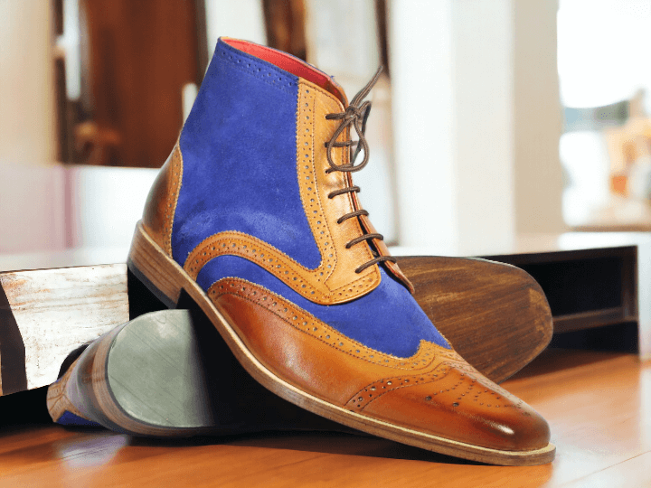 Expertly crafted for style and durability, these Men Tan Two Tone Leather Ankle Boots feature a unique hand painted design. Made from high quality leather, these boots offer both comfort and a touch of sophistication to any outfit. Elevate your shoe game with these one-of-a-kind boots.