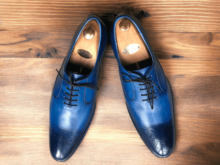 Expertly crafted for the modern gentleman, our Men Blue Office Shoes are the perfect combination of style and functionality. Made from premium Navy Oxfords leather and meticulously handmade, these luxury shoes will elevate your office wardrobe while providing all-day comfort. Step into success with our Men Blue Office Shoes.