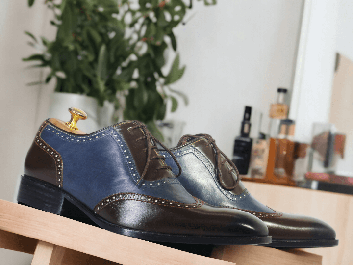 Introducing our handmade men's brown and blue cap toe leather shoes. These shoes are meticulously crafted by hand, ensuring the highest quality and attention to detail. Made with genuine leather, they provide both style and durability. Elevate your footwear game with these timeless and sophisticated cap toe shoes.