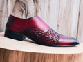 Expertly handcrafted from premium leather, these Double Monk Woven Burgundy Shoes add a touch of sophistication to any outfit. The intricate weaving detail and double monk strap design elevate the classic shoe, making it a versatile piece for any occasion. Step out in style with these high-quality, handmade shoes.