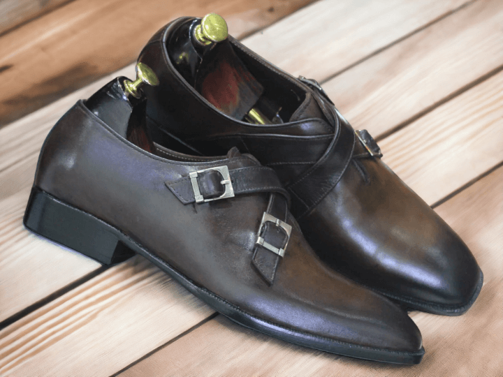 Experience superior craftsmanship with our Handmade Men's Leather Shoes. The double monk design in classic brown exudes sophistication, while ensuring comfort with premium quality leather. Elevate your style with these expertly crafted shoes.