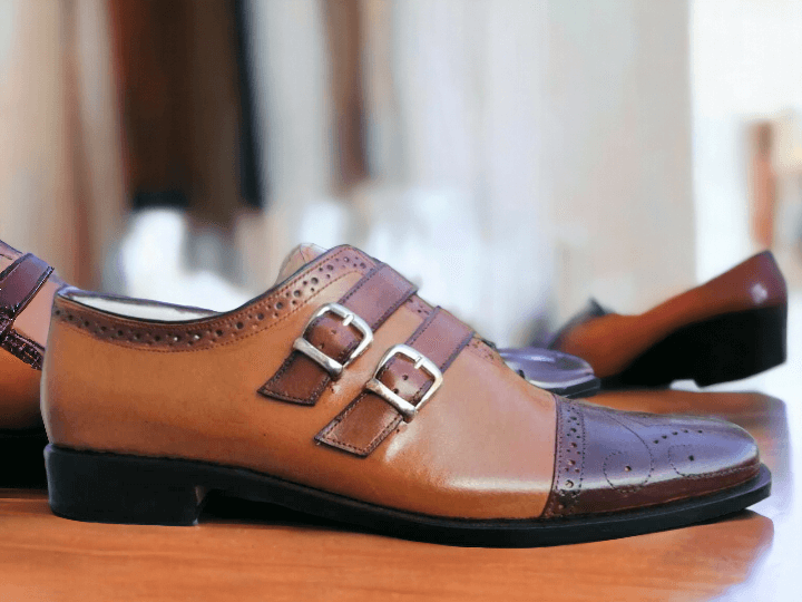 Expertly crafted with high-quality tan brown leather and a classic cap toe design, these handmade brogue shoes exude sophistication and style. The double buckle strap adds a touch of uniqueness while providing a secure fit. Elevate your dress shoe game with these timeless and durable shoes.