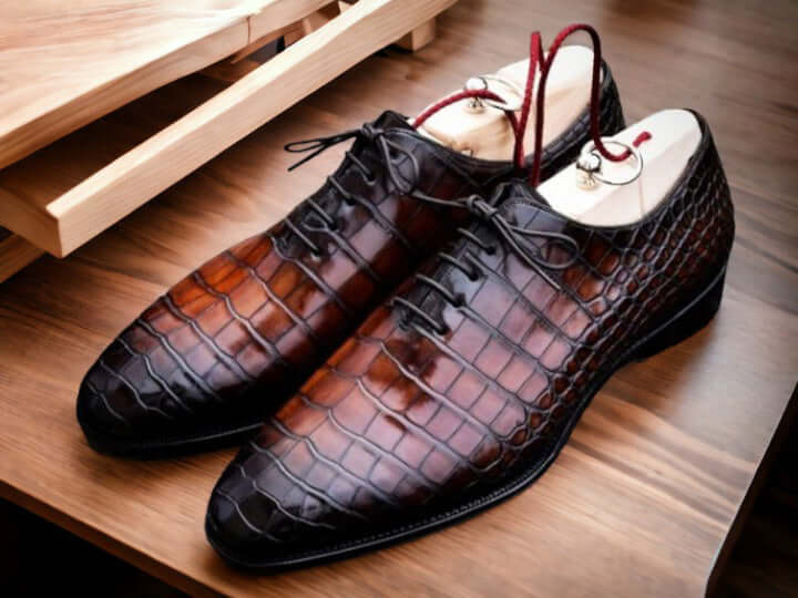 Forged from premium Italian leather, these men's dress shoes feature a classic alligator print pattern and meticulous hand-stitching. The combination of comfort and style makes these shoes perfect to wear for any occasion.