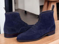 Expertly crafted and designed for the modern man, these handmade navy suede ankle boots are the perfect fusion of style and functionality. Made from high-quality leather and suede, these ankle high boots offer both classic and fashion-forward elements. Elevate your look and step out confidently in these versatile and stylish boots.