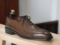 Expertly crafted, these men's brown oxfords shoes are the perfect combination of luxury and functionality. Handmade with premium materials, they exude sophistication and are perfect for the office or any formal occasion. Elevate your style with these high-quality shoes that will make a lasting impression.