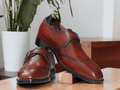 Step up your office wear game with our Men's Handmade Burgundy Monk Strap Shoes. Expertly crafted with a stylish buckle, these shoes exude professionalism and sophistication. Elevate your style and make a statement in the workplace.