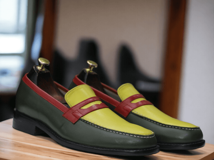 Expertly crafted and uniquely designed, our Multi Color Slipper is the perfect blend of style and comfort. Handmade with meticulous attention to detail, these men's loafers feature a colorful pattern that adds a playful touch to any outfit. Slip into luxury with our Penny Shoes.