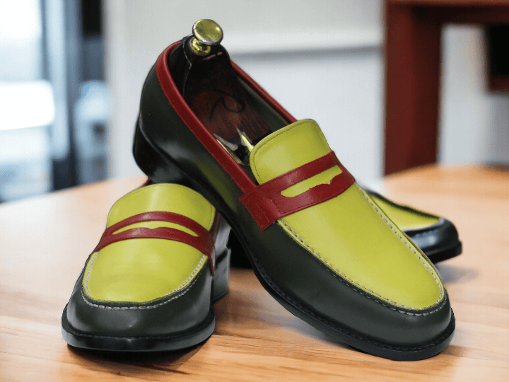 Expertly crafted and uniquely designed, our Multi Color Slipper is the perfect blend of style and comfort. Handmade with meticulous attention to detail, these men's loafers feature a colorful pattern that adds a playful touch to any outfit. Slip into luxury with our Penny Shoes.