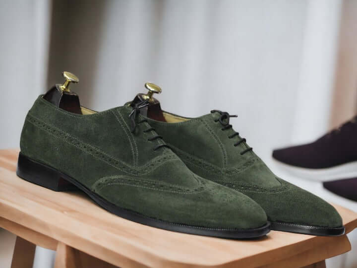 Elevate your style with our Handmade Green Suede Shoes. Crafted with attention to detail, our Wing Tip Shoes feature a classic lace-up design for a polished look. Perfect for any occasion, these shoes are not only stylish but also handcrafted for durability and comfort.