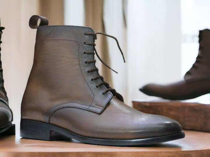 Expertly crafted with genuine leather, these Men's Brown Leather Boots offer both style and durability. Featuring a trendy buckle design and a sleek ankle cut, they are the perfect choice for dressy or casual occasions. Handmade with precision, these boots are a must-have addition to any man's wardrobe.