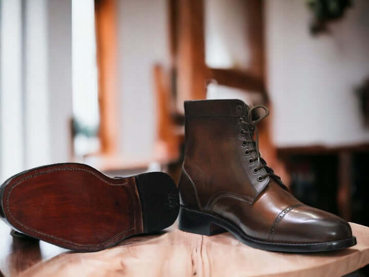 These Men's Brown Vintage Leather Boots are handcrafted using high-quality brown leather, making them durable and stylish. These versatile boots are perfect for any occasion, from dressing up for a night out to a more casual look for everyday wear. The buckle detail adds a touch of sophistication to these classic ankle boots.