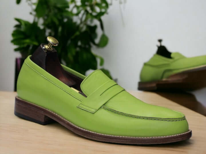 These handmade Green Color Loafers are perfect for anyone looking for a stylish and comfortable pair of shoes. Made with high quality materials, these unisex shoes offer both durability and fashion. Expertly crafted, these loafers will add a touch of sophistication to any outfit.