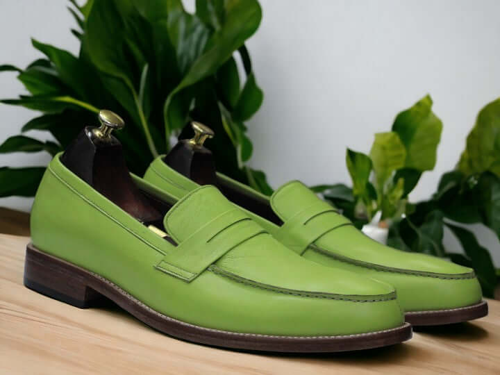 These handmade Green Color Loafers are perfect for anyone looking for a stylish and comfortable pair of shoes. Made with high quality materials, these unisex shoes offer both durability and fashion. Expertly crafted, these loafers will add a touch of sophistication to any outfit.