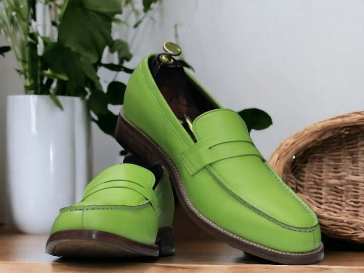 These handmade Green Color Loafers are perfect for anyone looking for a stylish and comfortable pair of shoes. Made with high quality materials, these unisex shoes offer both durability and fashion. Expertly crafted, these loafers will add a touch of sophistication to any outfit.