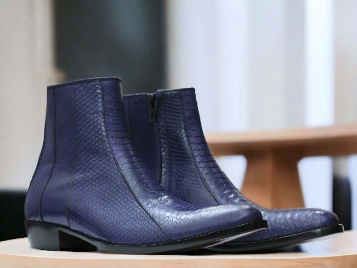 Our Bespoke Blue Handmade Black Colour Genuien Leather Boots,Python Texture Leather Boots are crafted from full-grain leather with a python-embossed texture, ensuring long-lasting quality and style. Our expert craftsmanship ensures enduring comfort and unparalleled durability. 