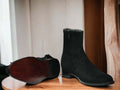 Expertly crafted with cow-hide leather and suede, these black ankle boots are the perfect combination of quality and style. Handmade by skilled artisans, these boots are designed for the winter season, providing warmth and durability. Elevate your footwear collection with these versatile and timeless boots.