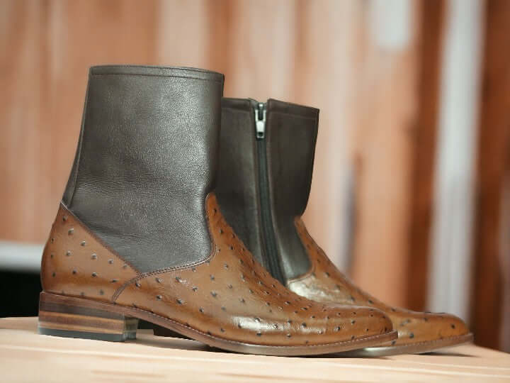 Elevate your style with Handmade Ostrich Print Brown Leather Boots for men. Ideal for both formal occasions and rugged adventures, these boots seamlessly blend luxury and durability. Crafted by hand from genuine ostrich leather, they offer comfort and longevity, enhancing any outfit effortlessly.