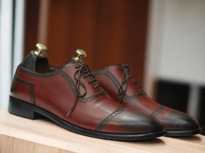 These Men's Burgundy Oxfords Leather Shoes are a sophisticated and stylish choice for any man. The lace up design ensures a secure and comfortable fit, while the soft leather material provides both durability and comfort. Elevate your dress shoe game with these timeless oxfords.