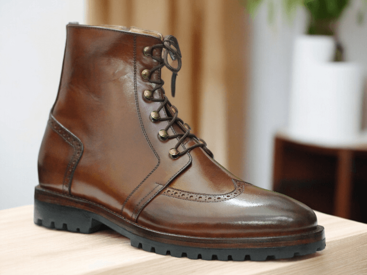 Introducing our Men Ankle Brown Leather Boots. These Lace Up Shoes are made with genuine leather for a stylish and durable look. Crafted for the modern man, it's the perfect addition to your wardrobe. Elevate your style with these Men's Dress Leather Shoes.