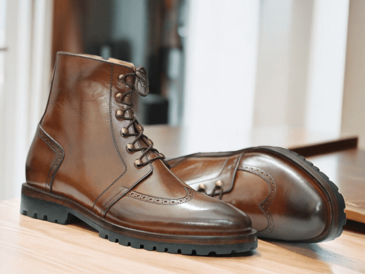 Introducing our Men Ankle Brown Leather Boots. These Lace Up Shoes are made with genuine leather for a stylish and durable look. Crafted for the modern man, it's the perfect addition to your wardrobe. Elevate your style with these Men's Dress Leather Shoes.