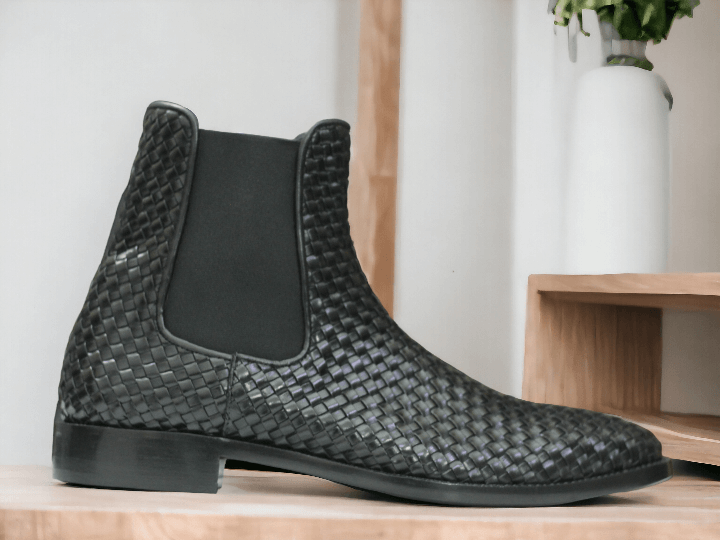 These Black  handmade men's woven Chelsea leather boots offer both style and durability. Handcrafted with the finest materials, they provide a comfortable and secure fit. With a classic design, these Chelsea boots are the perfect addition to any wardrobe. Elevate your footwear game today.