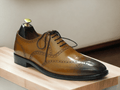 Introducing our Handmade Wing Tip Brogue Oxford Dress Leather Shoes, the perfect addition to any gentleman's wardrobe. Expertly crafted with a square toe and mustard dress leather, these shoes exude sophistication and style. Elevate your look with the finest quality craftsmanship.