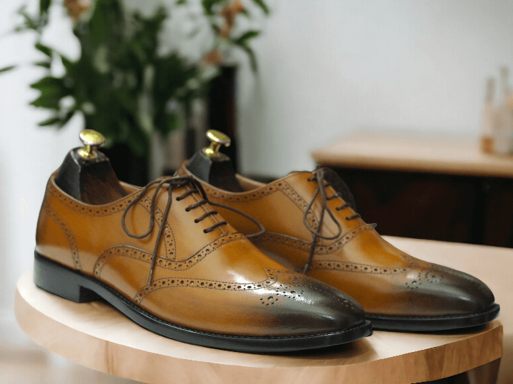 Introducing our Handmade Wing Tip Brogue Oxford Dress Leather Shoes, the perfect addition to any gentleman's wardrobe. Expertly crafted with a square toe and mustard dress leather, these shoes exude sophistication and style. Elevate your look with the finest quality craftsmanship.