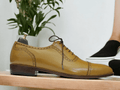 Expertly hand painted with a classic wing tip design, these men's Oxford shoes are a timeless addition to any wardrobe. Crafted from high-quality leather, they offer both style and durability. Elevate your formal attire with these brogue shoes and exude confidence and sophistication.