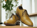 Expertly hand painted with a classic wing tip design, these men's Oxford shoes are a timeless addition to any wardrobe. Crafted from high-quality leather, they offer both style and durability. Elevate your formal attire with these brogue shoes and exude confidence and sophistication.