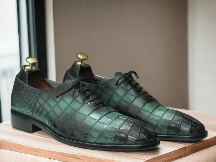 Expertly crafted, these Men's Handmade Alligator Print Sea Green Leather Shoes combine style and comfort. Made with high-quality leather, the alligator print adds a unique touch. With a sleek sea green color, elevate your footwear game with these stylish and durable shoes.